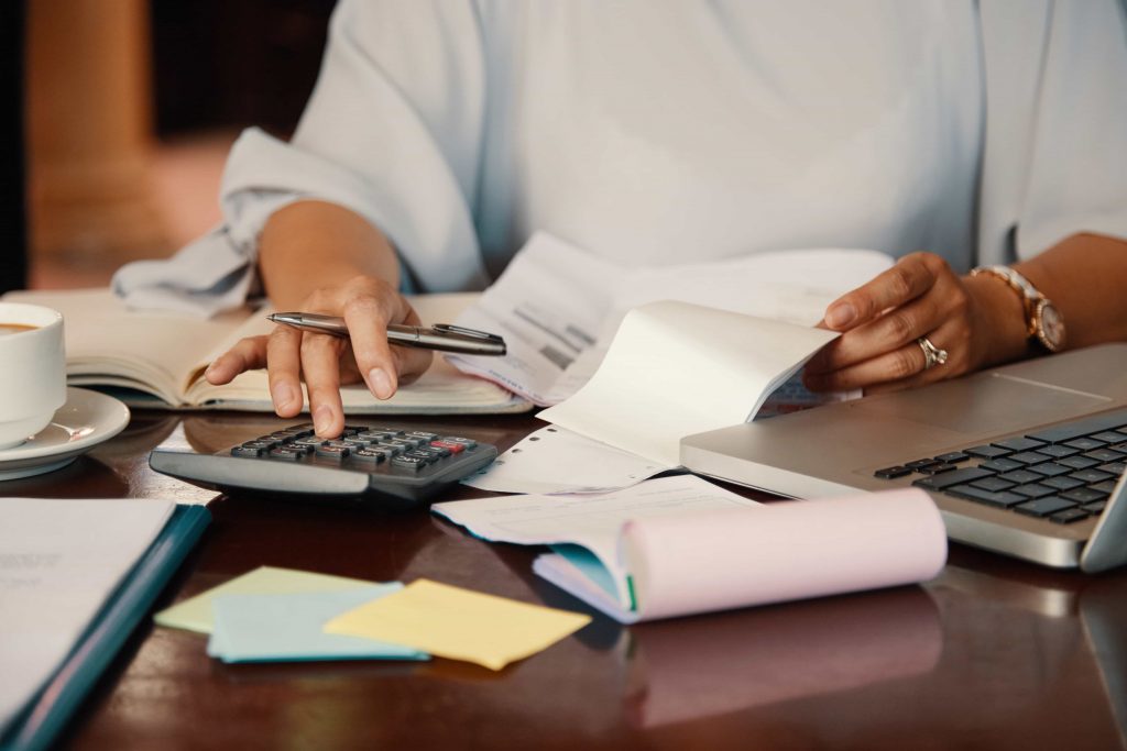 a woman pay attention to notices by IRS to avoid IRS penalties In &Near Bronx, NY