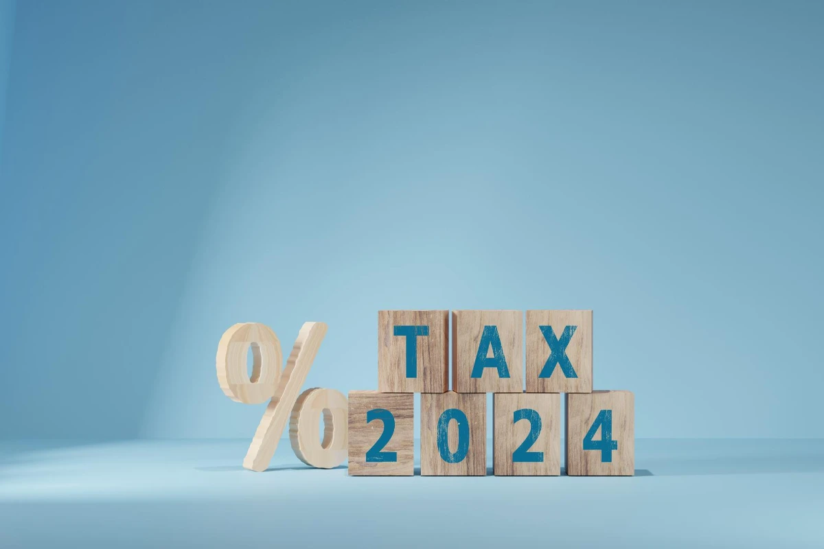 tax wooden letter and 2024 number on wooden block pay tax in 2024 years tax concept