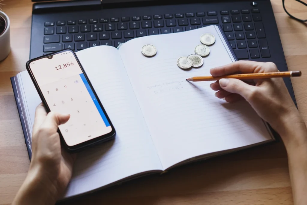 Closeup shot of an entrepreneur working from home on his personal finances and savings
