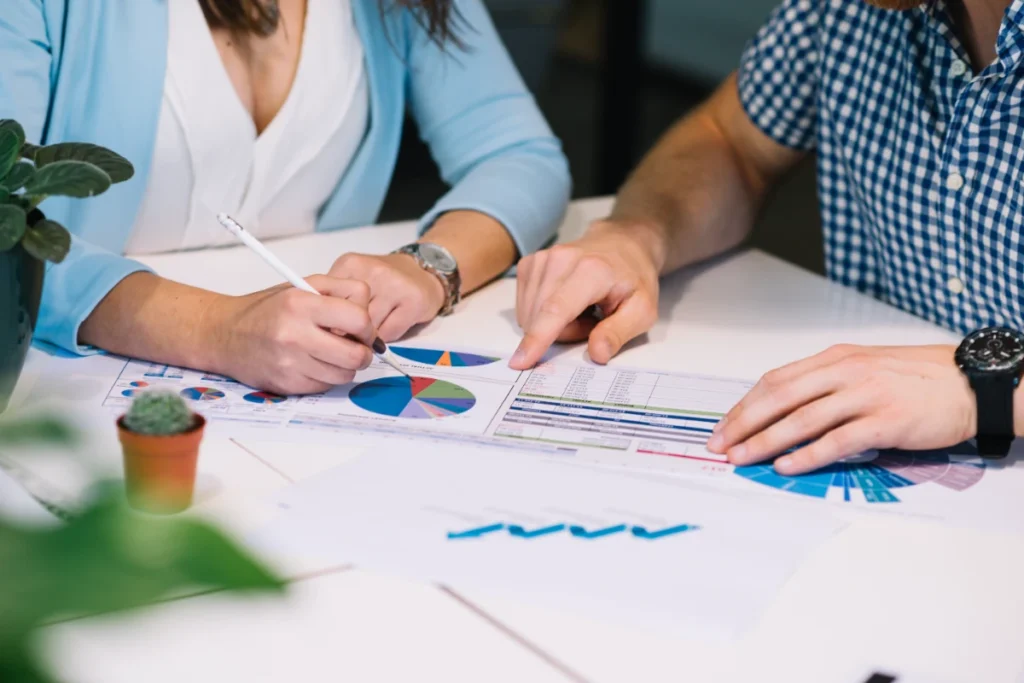 people discussing and planning tax strategies during a meeting