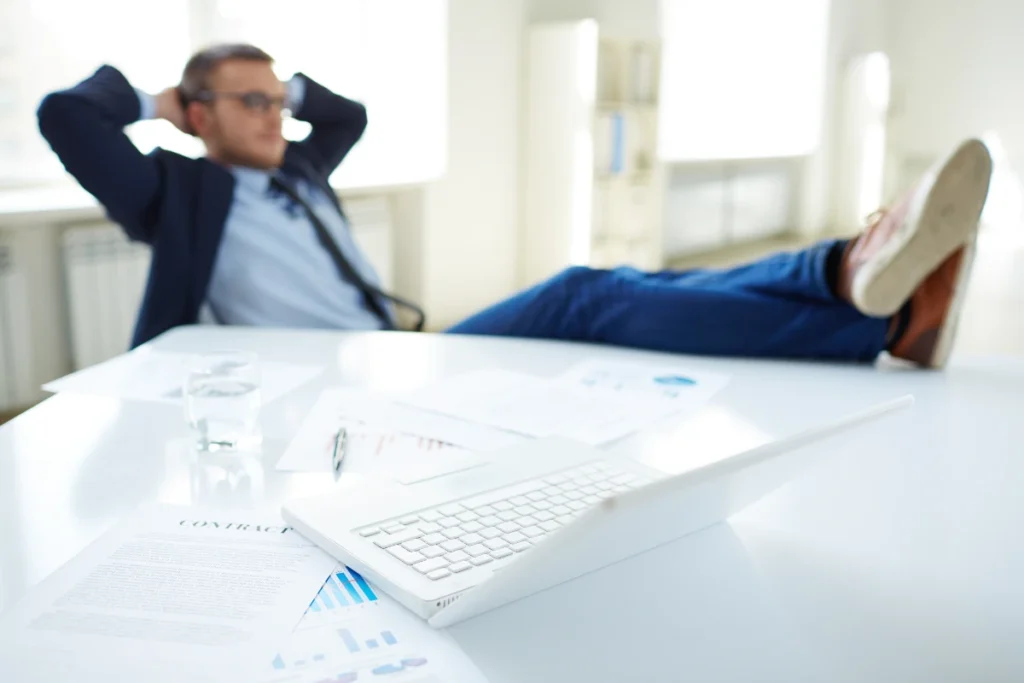 relaxed executive in his office