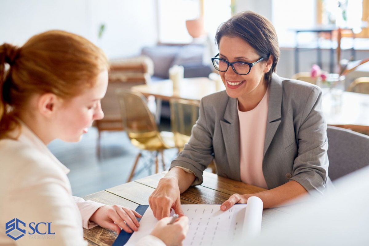 CPA helping a woman with her tax problems in and near Bronx, NY